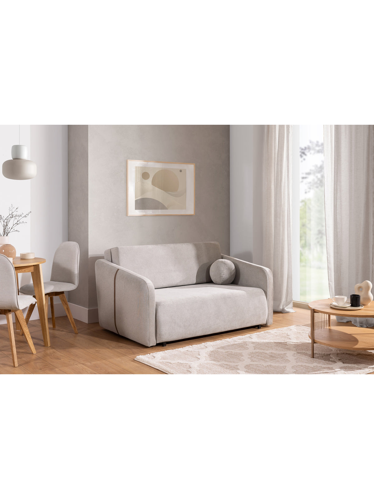 Sofa Zeldia 155 w jasnoszarym kolorze z czarnymi nóżkami i funkcją spania