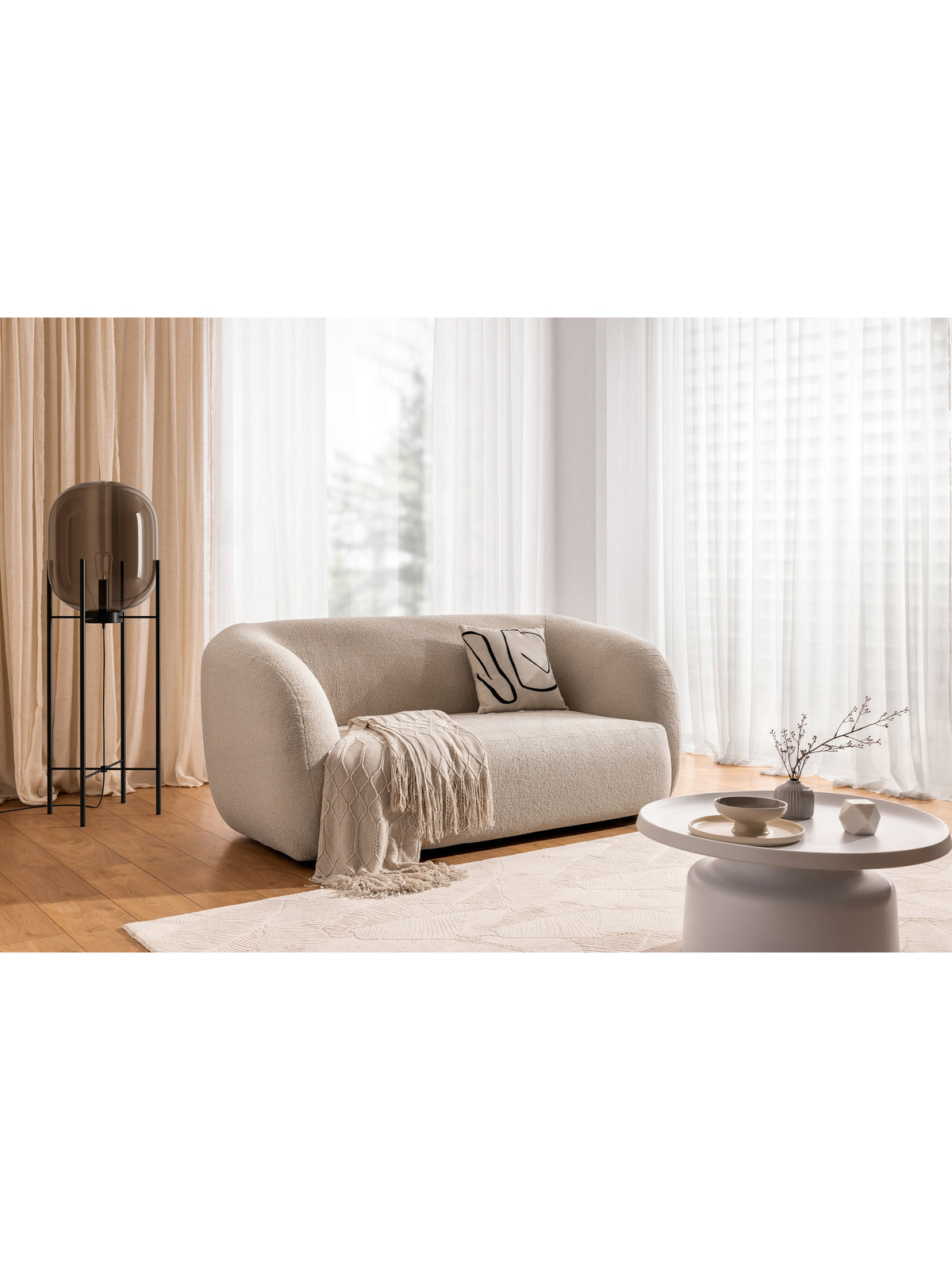 Sofa dwuosobowa Dalin II beżowa, nowoczesna o zaokrąglonych kształtach