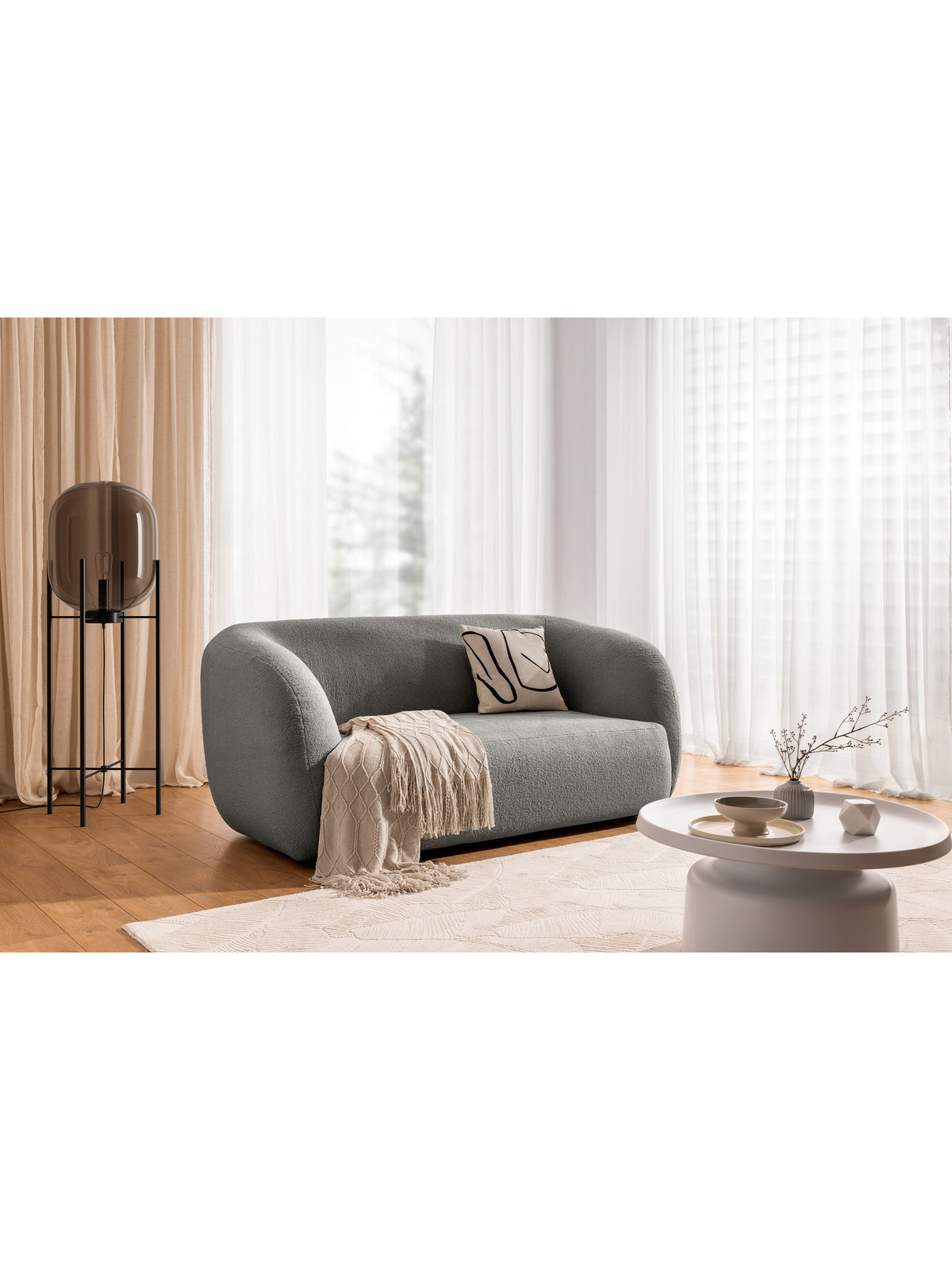 Sofa do salonu Dalin II w popielatej tkaninie bouclé Lambi 11, widok frontalny
