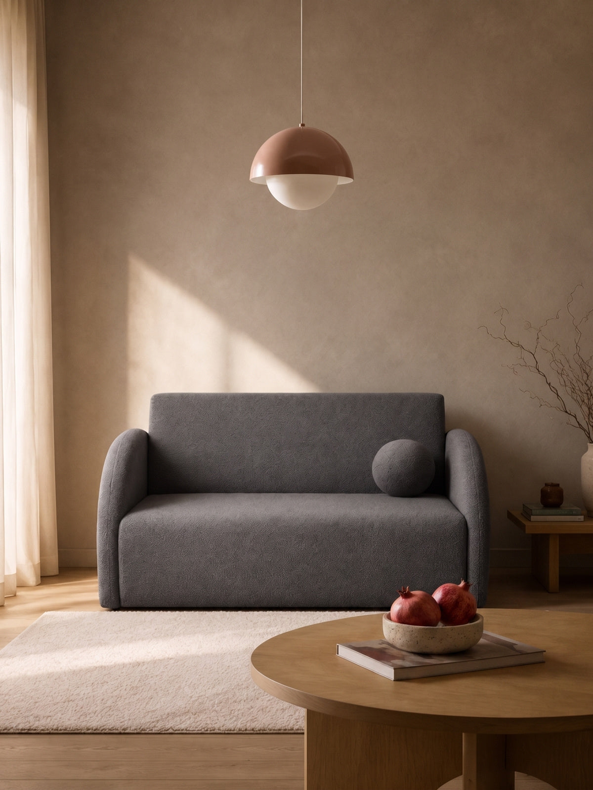 Sofa rozkładana Nubi 120 cm szara boucle z pojemnikiem i poduszką w nowoczesnym wnętrzu