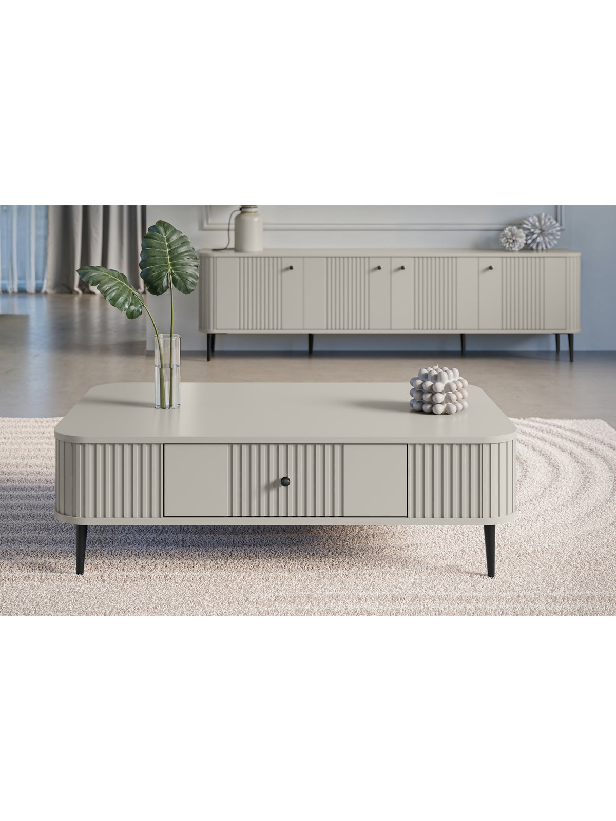Stolik kawowy Vesper 103x60 cm kaszmir z ryflowanym frontem i czarnymi metalowymi nogami